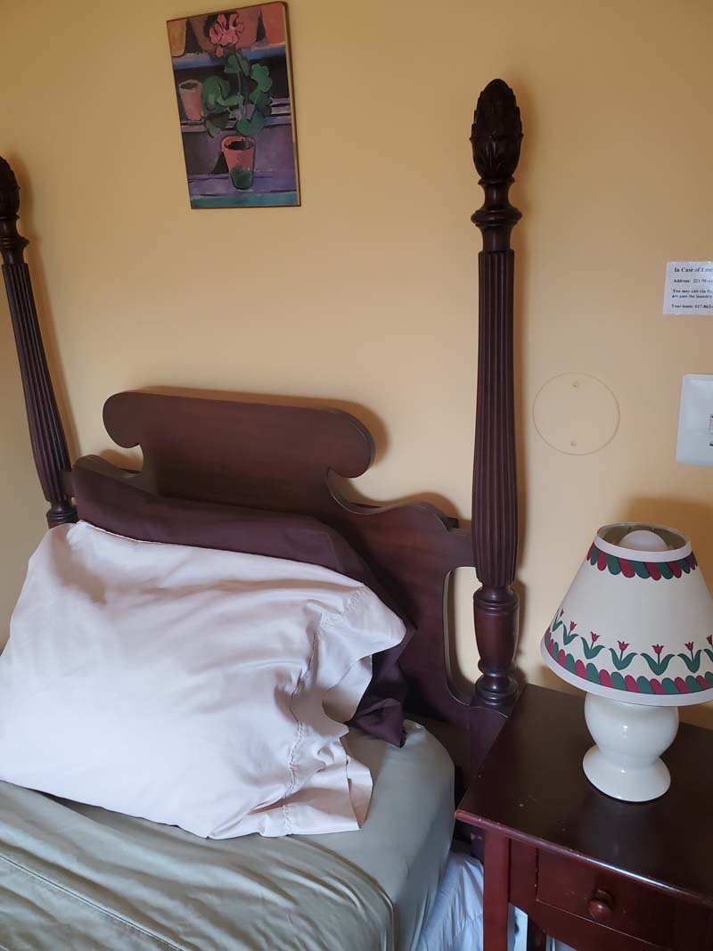 poster headboard and nightstand
